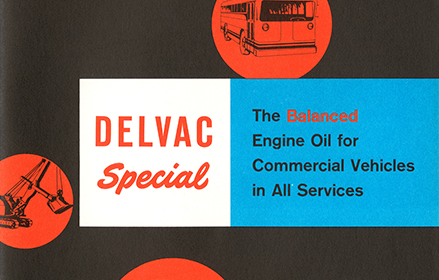Iklan produk Delvac Spesial dengan truk dan alat berat